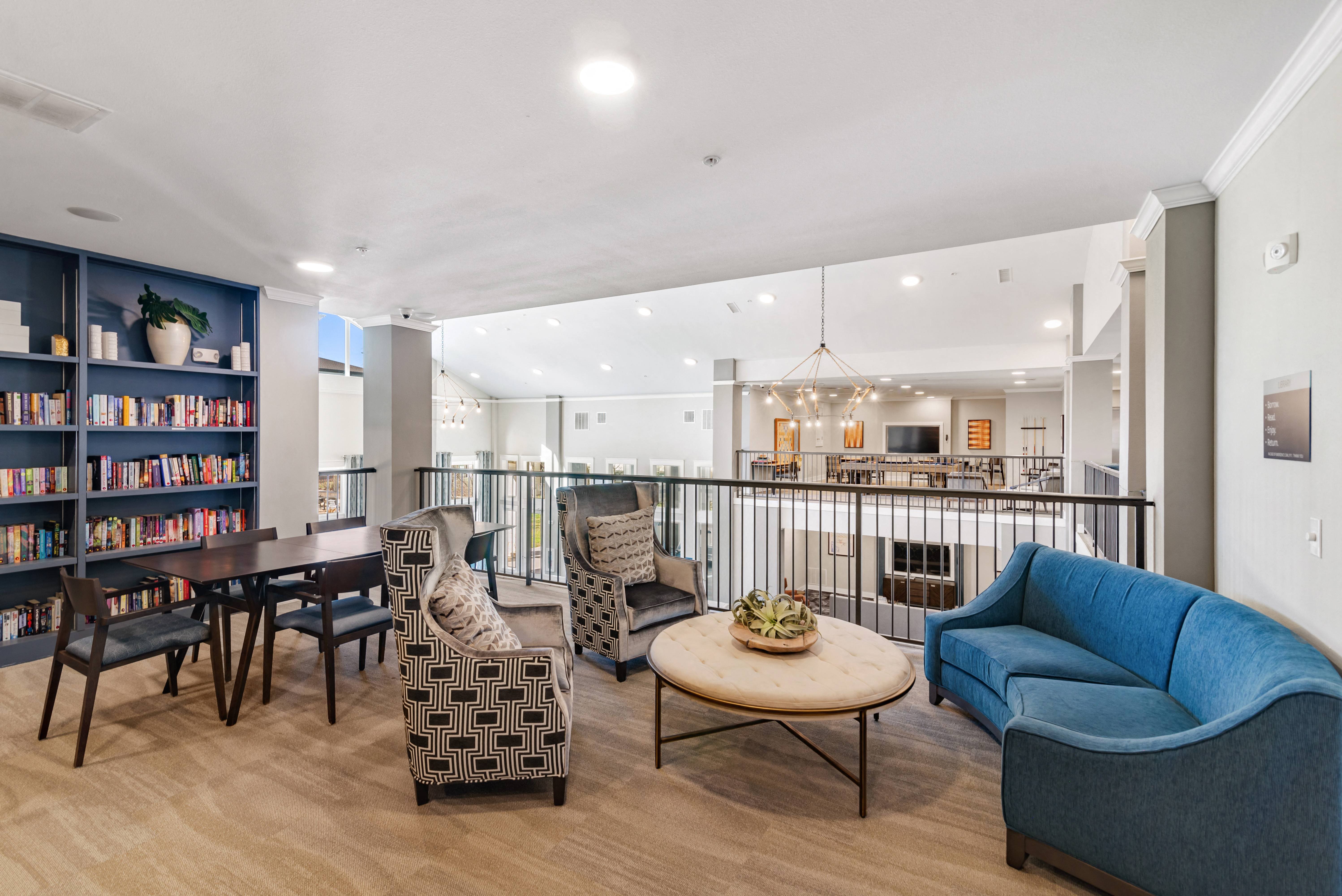 a communal clubhouse lounge area at a senior apartment community